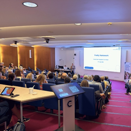 Presentation in an auditorium at the Frailty Conference 2026