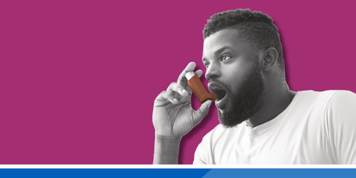 A person using an inhaler